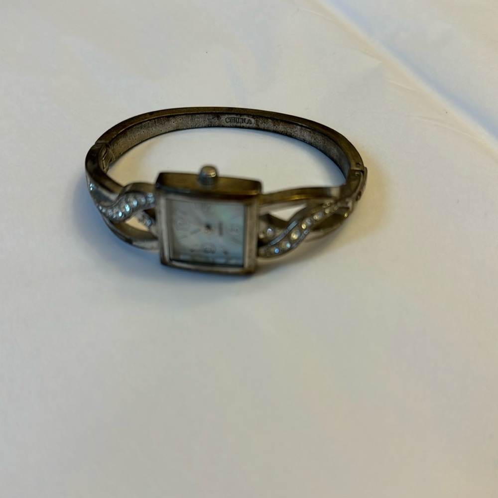 Watch bracelet, vintage, needs cleaning /battery, fastens at sides.